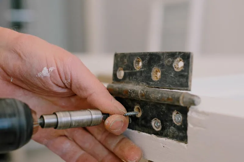 Removing a worn hinge from an interior door frame for replacement